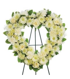 Sympathy Heart Standing Spray All White. An arrangement by Burlington Flowers.