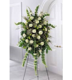 ELEGANT SPLENDOR STANDING SPRAY. An arrangement by Elegant Florist.