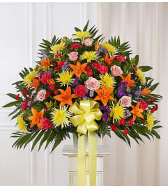Standing Basket- Bright. An arrangement by Elegant Florist.
