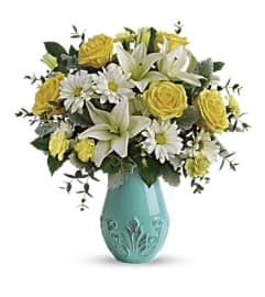 Teleflora Aqua Dream Bouquet. An arrangement by Michael's Flowers.