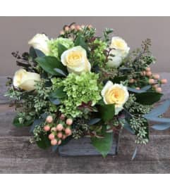 It's A Garden Season. An arrangement by Seasons Change Designs.
