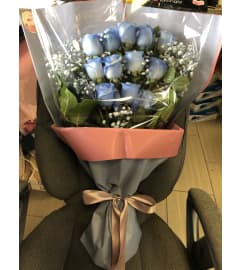 Simple Blue Bouquet. An arrangement by Sunrise Floral and Gifts.