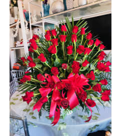 Eternal Love Rose Tribute. An arrangement by Sonia's Florist.
