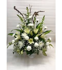 PURE WISHES. An arrangement by White's Flowers.
