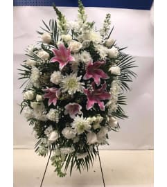 A TOUCH OF PINK SENTIMENTS. An arrangement by White's Flowers.