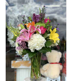 Spring Delights. An arrangement by Flower World and Gifts.