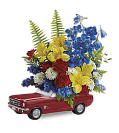 Mustang Full Of Flowers. An arrangement by K1 Floral Studio.
