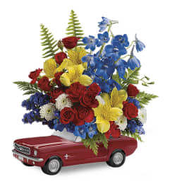 Mustang Full Of Flowers. An arrangement by K1 Floral Studio.