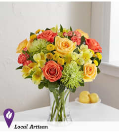 CITRUS SUNSHINE. An arrangement by J.D. Ballantine's Flowers and Gifts.