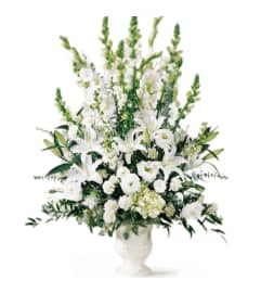White Basket Arrangement. An arrangement by Top Flower Designers.