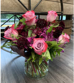 Deep Purple Floral Bouquet. An arrangement by Violeta's Flower Shop.