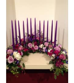 Candle Light Memorial. An arrangement by Novak's Flower Shoppe.