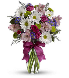 PrettyPlease. An arrangement by Red Rose Incredible Florist.