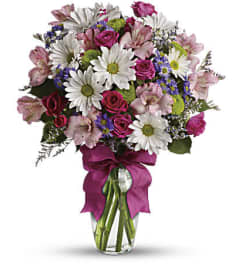 Pretty Please AV. An arrangement by Avenida Flowers.