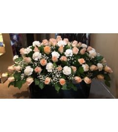 Final Touch. An arrangement by Petals.