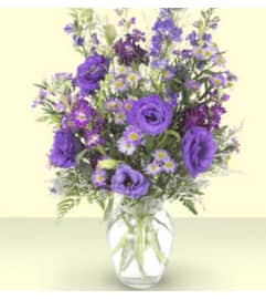 Purple Serenity. An arrangement by Avenue Flowers and Gifts. Purple Serenity. An arrangement by Avenue Flowers and Gifts.