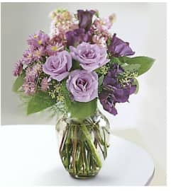 Lavender Kiss. An arrangement by Avenue Flowers and Gifts. Lavender Kiss. An arrangement by Avenue Flowers and Gifts.