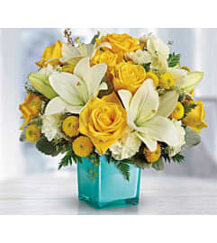 Turquoise Laughter. An arrangement by Avenue Flowers and Gifts.