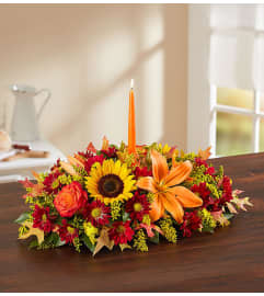 FIELDS CENTERPIECE. An arrangement by J.D. Ballantine's Flowers and Gifts.