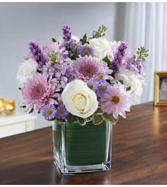 PURPLE TEARS. An arrangement by J.D. Ballantine's Flowers and Gifts.