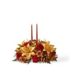 FTD's Bright Autumn™ Centerpiece. An arrangement by Roma James Gifts.