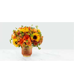 Autumn's specialty. An arrangement by Rennix Flowers.