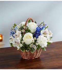PEACE PRAYERS BLUE and WHITE. An arrangement by J.D. Ballantine's Flowers and Gifts.