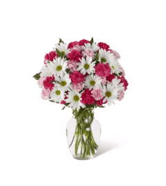 The Sweet Surprises® Arrangement by FTD®. An arrangement by Roma James Gifts.
