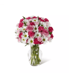 FTD® Sweet Surprises® Arrangement. An arrangement by Floratechnics. FTD® Sweet Surprises® Arrangement. An arrangement by Floratechnics.