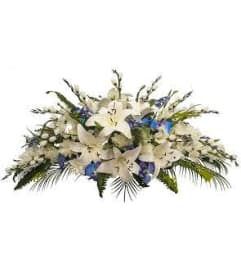 wreathe seasonal grave. An arrangement by Flowers 4 U Helping Hand.