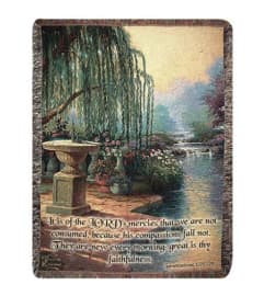The Hour of Prayer Tapestry Throw. An arrangement by Simpson's Florist.