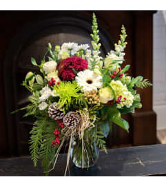 Warmth of Christmas. An arrangement by Napanee Blooms.