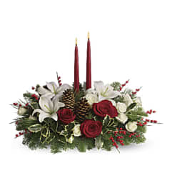 HOLIDAY WISHES CENTERPIECE. An arrangement by J.D. Ballantine's Flowers and Gifts.