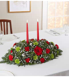 SEASON'S CENTERPIECE. An arrangement by J.D. Ballantine's Flowers and Gifts.