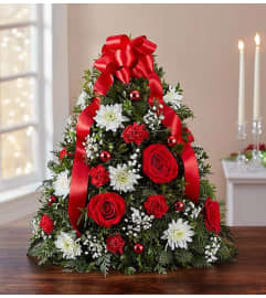 The Holiday Tree®. An arrangement by Butterflies Flower Shop.
