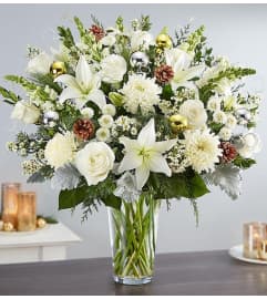 The Dazzling Winter Wonderland Flower Arrangement. An arrangement by Butterflies Flower Shop.