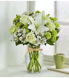 The Serene Green™. An arrangement by Butterflies Flower Shop.