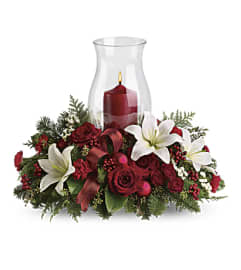 Holiday Glows. An arrangement by Love Story Florist.