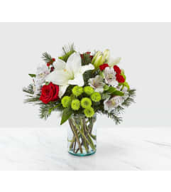 Christmas Spirit Flowers. An arrangement by Love Story Florist.