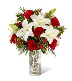 Elegance Silver Snowflake. An arrangement by Avenue Flowers and Gifts. Elegance Silver Snowflake. An arrangement by Avenue Flowers and Gifts.