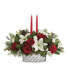 ATC Sparkling season Centerpiece. An arrangement by A Touch of Class Flowers and Drapery.