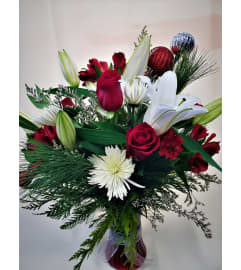 Holiday Classic. An arrangement by Flowers Plus.