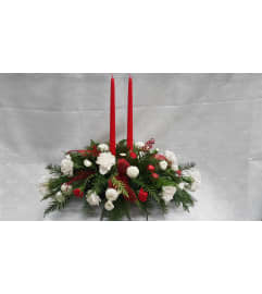 Christmas Magic-red and white. An arrangement by Harriet's Flower and Gift Shop.