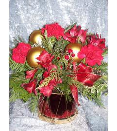 Christmas is drumming. An arrangement by Country Garden Floral Boutique.
