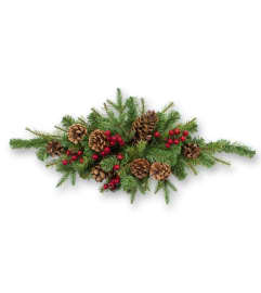 SWAG OF GREENS. An arrangement by Flowers by Priscilla. SWAG OF GREENS. An arrangement by Flowers by Priscilla.