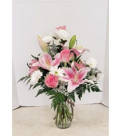 Eva Riley. An arrangement by Zaisers Florist and Greenhouse.