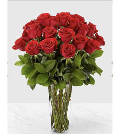 16 Red Rose Bouquet. An arrangement by Seasons Change Designs.