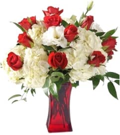 Tender Kiss. An arrangement by Flower Lane.