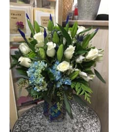 Beautiful in Blue and White by Vivian. An arrangement by Vivian Flowers.