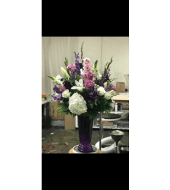 Purple to my heart. An arrangement by Massey's House of Flowers.